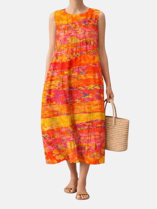 Vestido midi sin mangas estampado coral y fucsia, falda amplia y dobladillo midi