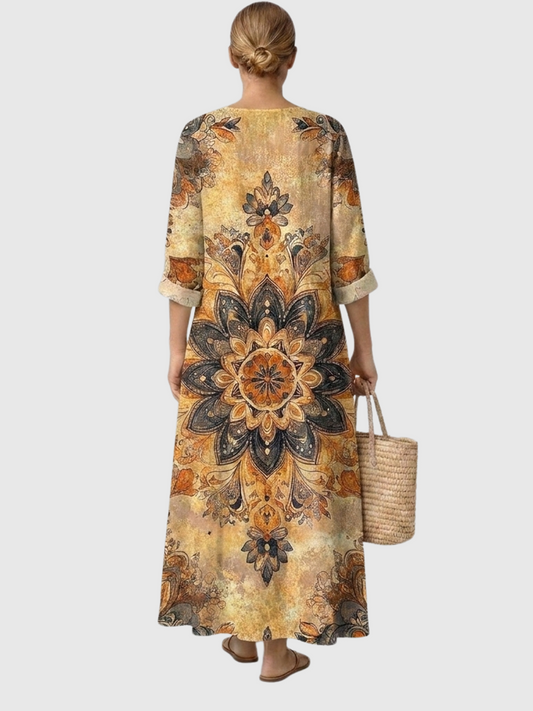 Vestido midi de manga tres cuartos y cuello en V, estampado floral tonos mostaza y negro