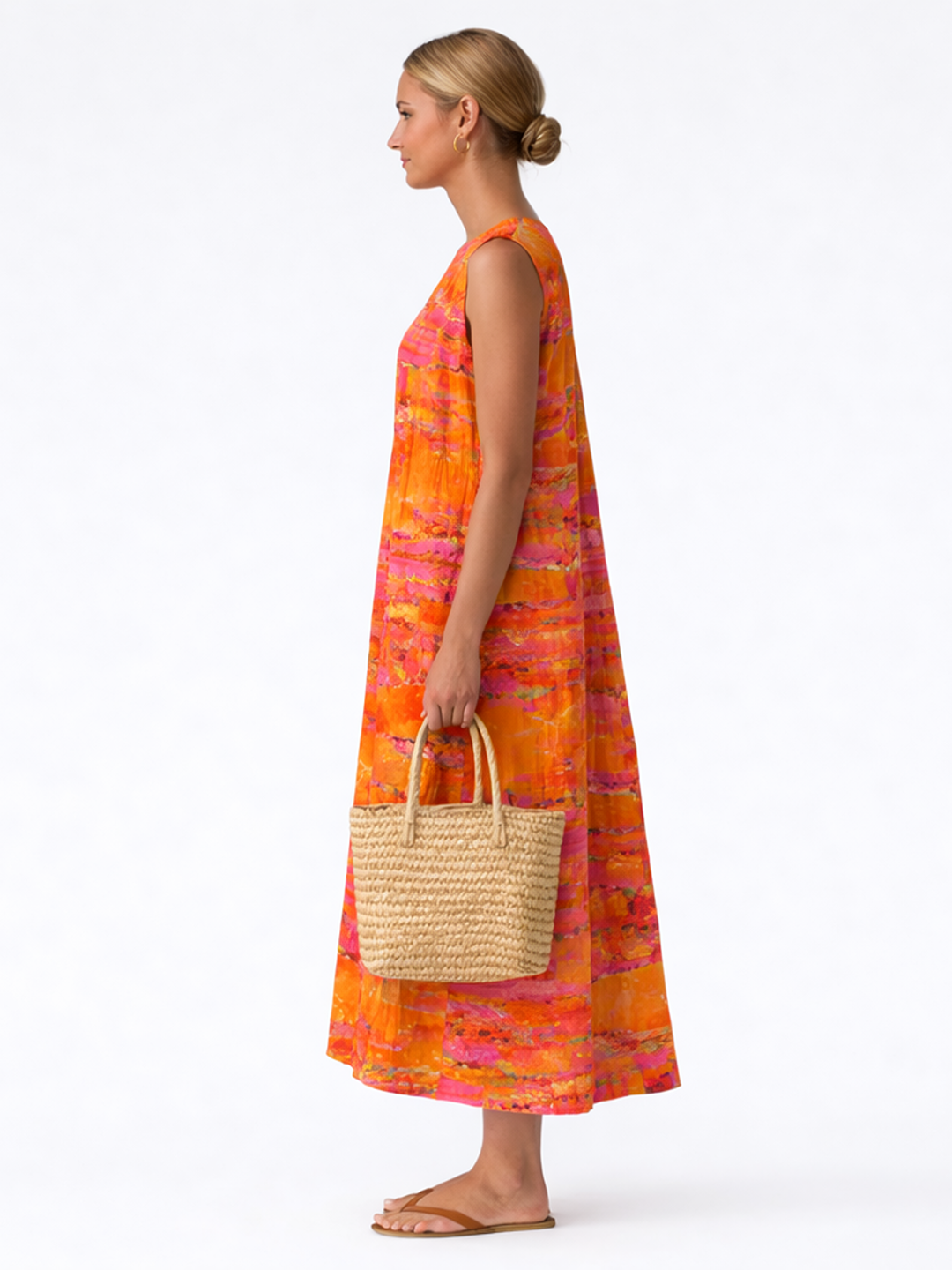 Vestido midi sin mangas estampado coral y fucsia, corte recto hasta la rodilla