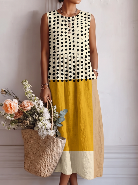 Vestido midi sin mangas con cuello redondo, puntos negros y franja mostaza