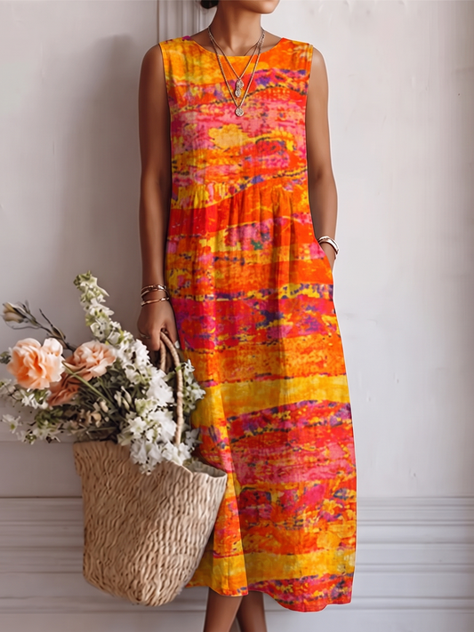 Vestido midi sin mangas estampado coral y fucsia, escote redondeado y tirantes