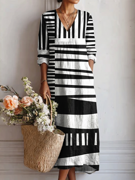 Vestido midi con escote en V, estampado gráfico blanco y negro, mangas 3/4