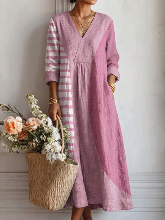 Vestido midi de lino rosa con cuello pico y puños abullonados, mangas a rayas blancas