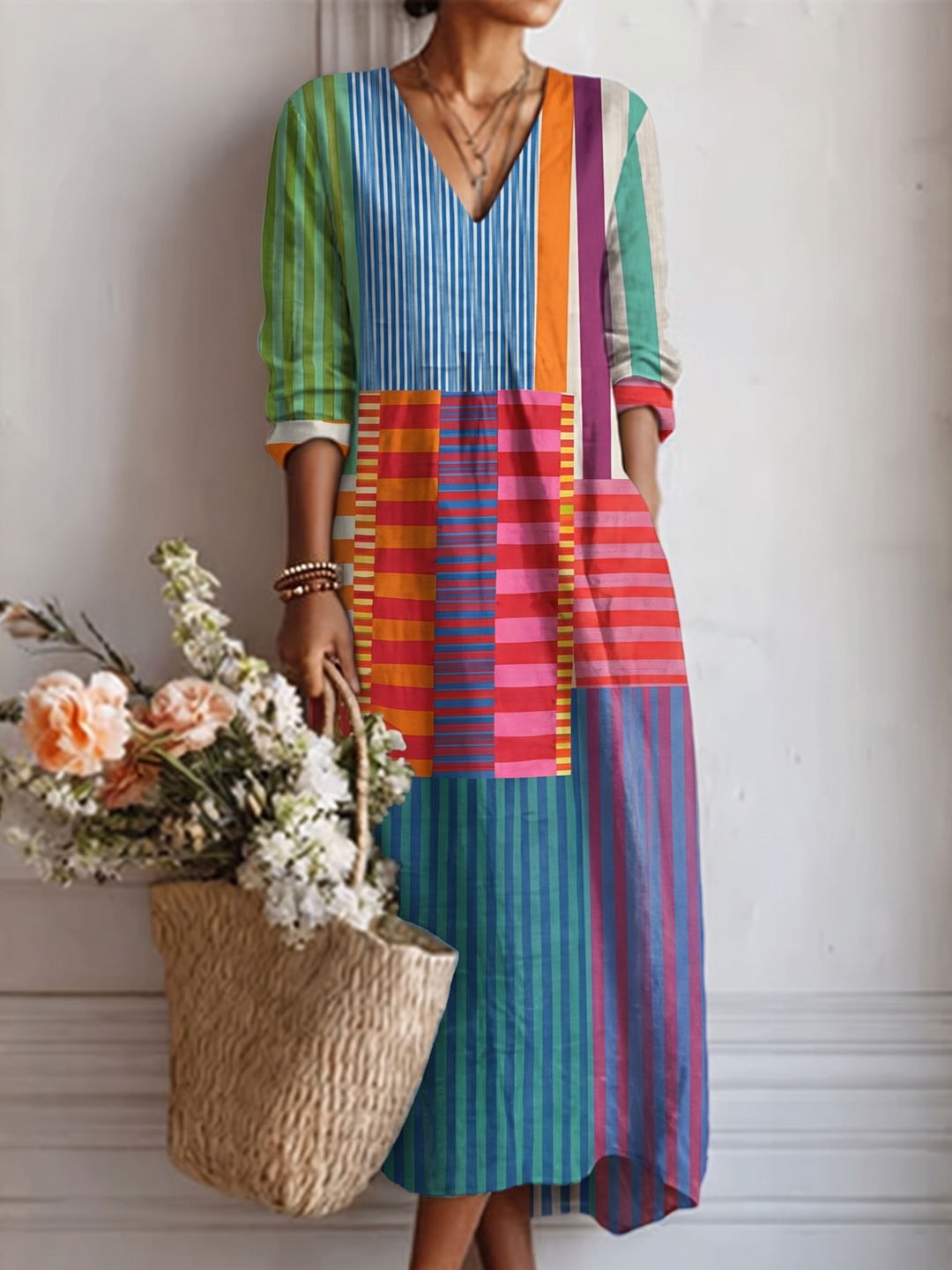 Vestido midi multicolor con panel central a cuadros y rayas verticales, mangas abullonadas