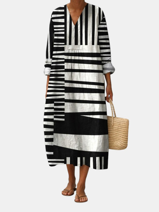 Vestido midi de rayas en blanco y negro, escote en V y manga 3/4, holgado