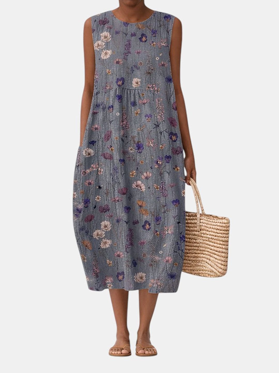 Vestido midi sin mangas azul gris con flores y cuello redondo, largo a media pierna